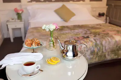 Letto o letti in una camera di Europa Hotel Design Spa 1877