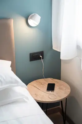 Letto o letti in una camera di Hotel Plaza