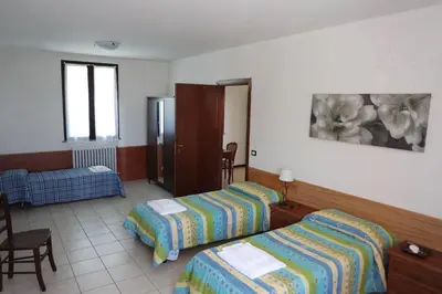 Letto o letti in una camera di Affittacamere Da Franco