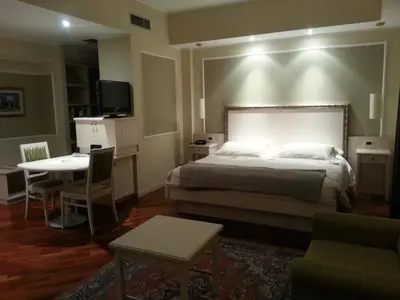 Letto o letti in una camera di Albergo Della Roccia