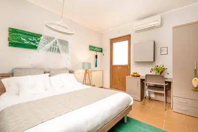 Letto o letti in una camera di Carugio Remilde