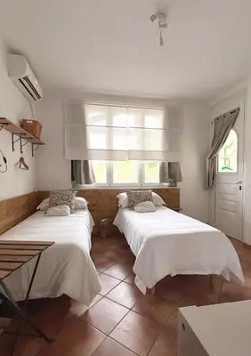 Letto o letti in una camera di Il Sassoscritto Bed and Breakfast