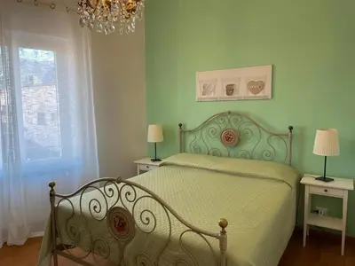 Letto o letti in una camera di Casa Riviera
