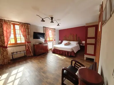 Letto o letti in una camera di Locanda Il Rustichello