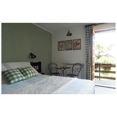 Letto o letti in una camera di Locanda Il Rustichello