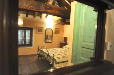 Letto o letti in una camera di Corte Pioppazza