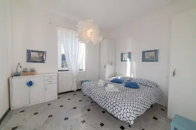Letto o letti in una camera di Cosy Apartment by PortofinoVip
