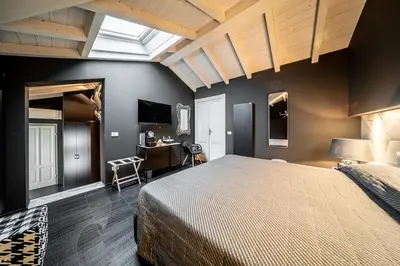 Letto o letti in una camera di Palazzo Gozzi Bed & Beauty