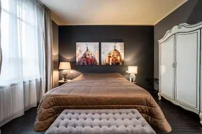 Letto o letti in una camera di Palazzo Gozzi Bed & Beauty