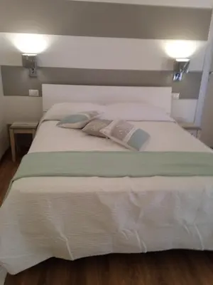 Letto o letti in una camera di Suite Simonetta