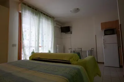 Letto o letti in una camera di Parmigianino Apartments