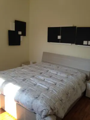 Letto o letti in una camera di Villa Mara
