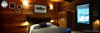 Letto o letti in una camera di Trout Lodge
