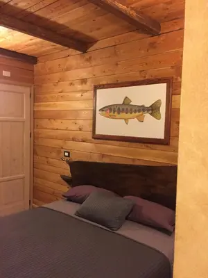 Letto o letti in una camera di Trout Lodge