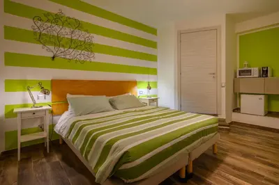 Letto o letti in una camera di Il Murice