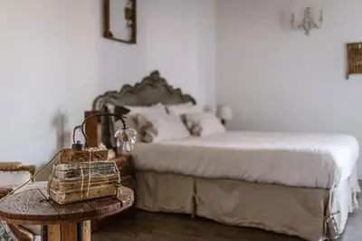 Letto o letti in una camera di B&B Giarola 25.2