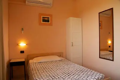 Letto o letti in una camera di La Quercia Hotel con Ristorante