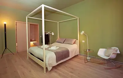 Letto o letti in una camera di Casa Iolanda