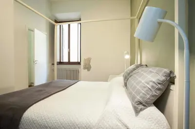 Letto o letti in una camera di Casa Iolanda