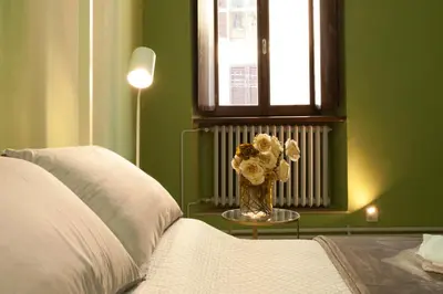 Letto o letti in una camera di Casa Iolanda