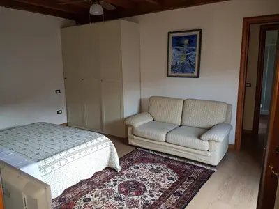 Letto o letti in una camera di Corte Pomponazza