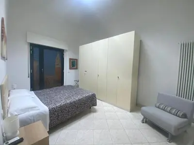 Letto o letti in una camera di La casa di Marisa