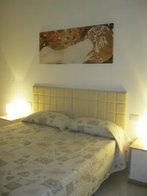 Letto o letti in una camera di La casa di Marisa
