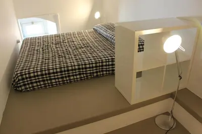 Letto o letti in una camera di Appartamento della Baia