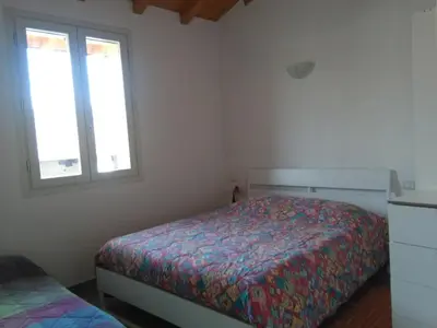 Letto o letti in una camera di Up b&b