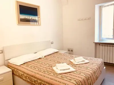 Letto o letti in una camera di Appartamenti Sant Andrea