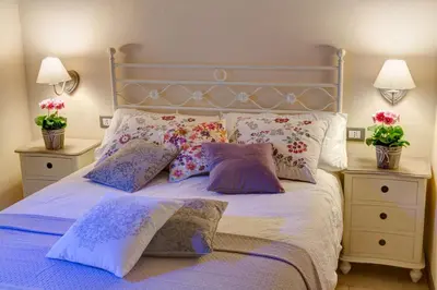 Letto o letti in una camera di Le Stanze di Rigoletto