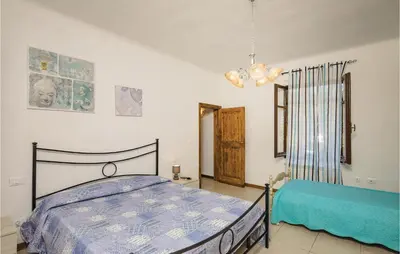 Letto o letti in una camera di Casa Di Greta