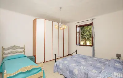 Letto o letti in una camera di Casa Di Greta