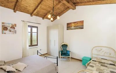 Letto o letti in una camera di Casa Di Francesca
