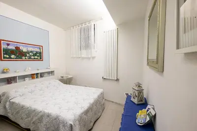Letto o letti in una camera di Casa Pervinca
