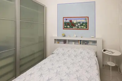 Letto o letti in una camera di Casa Pervinca
