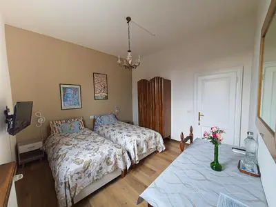 Letto o letti in una camera di Il Giardino della Musica