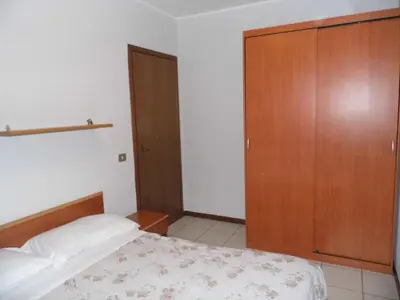 Letto o letti in una camera di Bilocale Mentana 21