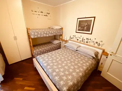 Letto o letti in una camera di Amici Miei Rooms