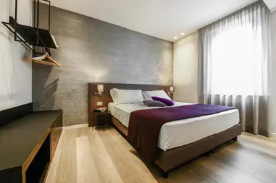 Letto o letti in una camera di La Bella Modena