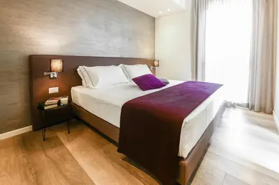 Letto o letti in una camera di La Bella Modena