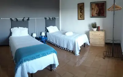 Letto o letti in una camera di Dolce Casa