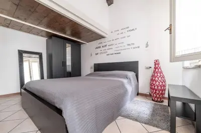 Letto o letti in una camera di Casa della Musica