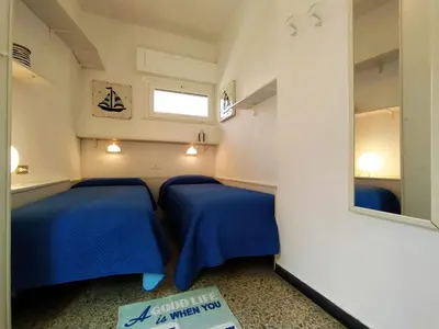 Letto o letti in una camera di Cristina House