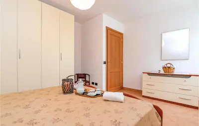 Letto o letti in una camera di Cozy Apartment In Localitabracco Ge