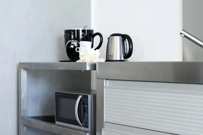 Set per la preparazione di tè e caffè presso Casa Giulia - Apartment beachfront with 2 bedrooms, air conditioning and private parking, just 30 meters from the beach