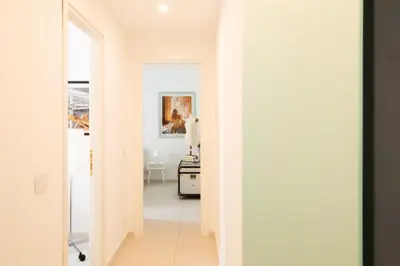 Letto o letti in una camera di Casa Giulia - Apartment beachfront with 2 bedrooms, air conditioning and private parking, just 30 meters from the beach