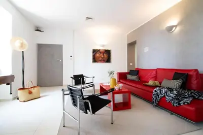 Area soggiorno di Casa Giulia - Apartment beachfront with 2 bedrooms, air conditioning and private parking, just 30 meters from the beach