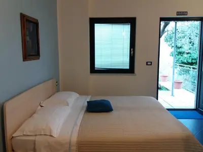 Letto o letti in una camera di Affittacamere arabafenice