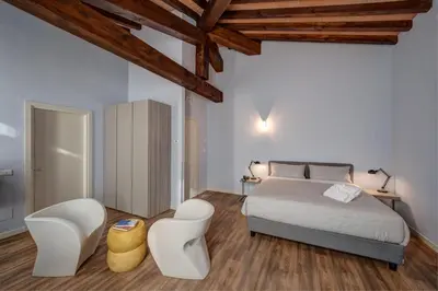Letto o letti in una camera di Hotel Cortaccia Sanvitale
